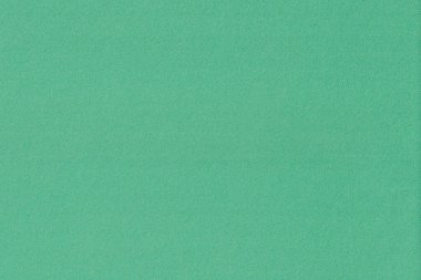 Yeşil kağıt dokusu. Tasarım için soyut arkaplan ve doku. Yüksek çözünürlüklü yüksek kaliteli tahıl dokusu. Renkli kağıt arkaplanı.