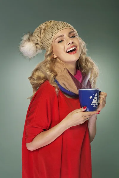 Laughing girl with cup of cacao — Stock Photo, Image