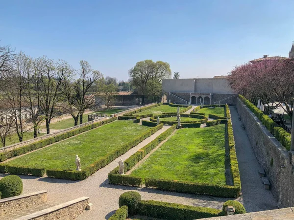 Italian Garden and statue in Volta Mantovana and Stock Picture