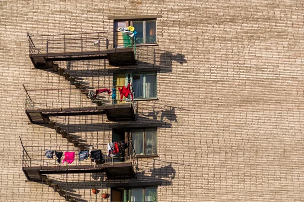 Balconies in a brick building — Stock Photo, Image