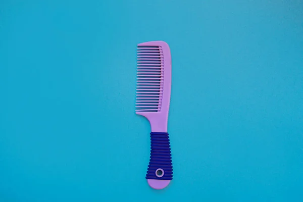 Beautiful Female Purple Hairbrush Blue Background Hair Care Concept Top — Stock Photo, Image