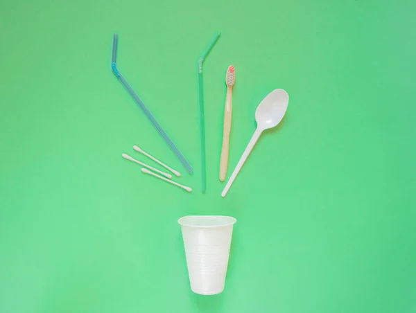 Various Garbage Form Straws Toothbrush Green Background Ecological Concept Separation — Stock Photo, Image