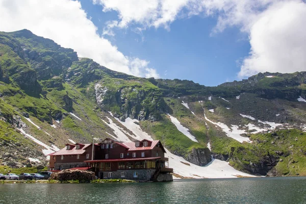 Lake on top of the mountain. The house on top of the mountain. Transfagarasan