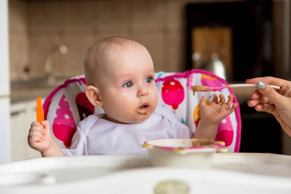 cute little baby having food