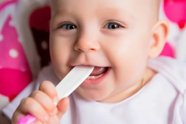 Cute Little Baby Having Food Colorful Baby Chair Stock Image