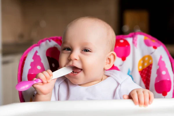 Cute Little Baby Having Food Colorful Baby Chair Royalty Free Stock Images