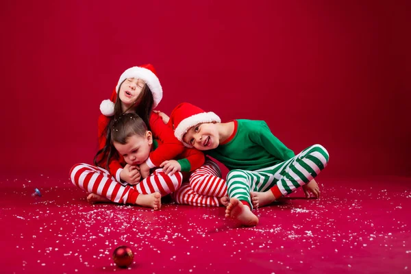 Cute Kids Brothers Sister Posing Sitting Studio Floor Festive Clothes — Stockfoto