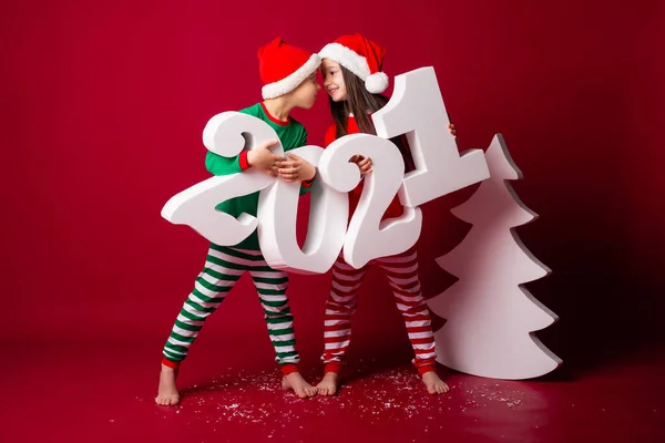 Boy Girl Festive Costumes Posing 2021 Numbers Looking Each Other — Stockfoto
