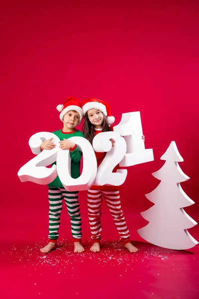 Brother Sister Festive Costumes Holding Big 2021 Numbers — Stockfoto
