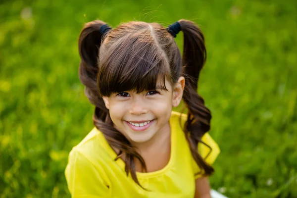 Happy Little Indian Girl Yellow Shirt Laughs Summer Lawn — Stock Photo, Image