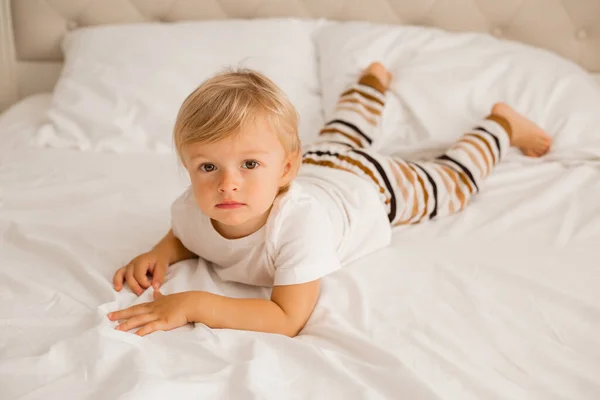 Boy Lying Bed White Shirt Striped Pants — Stock Photo, Image