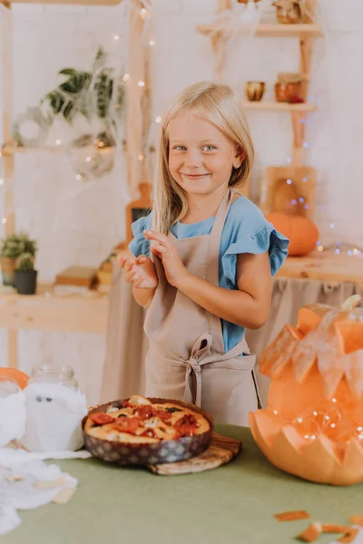 Blonde Baby Girl Long Hair Apron Kitchen Decorated Pumpkins Garlands — Stock Photo, Image