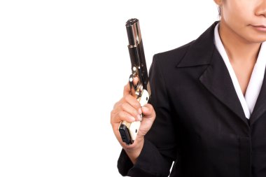 Elinde bir silah arka yüzüne iş elbiseli kadının yakın çekim