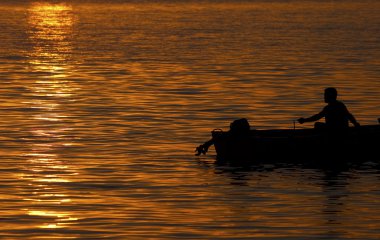 Silhouette fisherman clipart