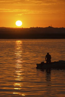 Silhouette fisherman clipart