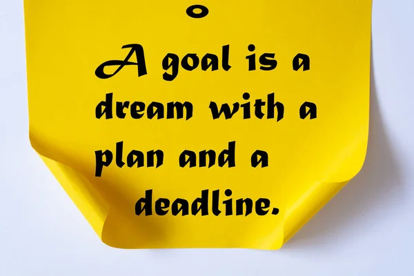 Motivational quote. A dream is just a dream. A goal is a dream with a plan and a deadline.