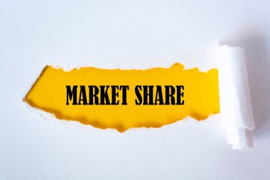 Yırtık kağıdın altında yazılan pazar payı.