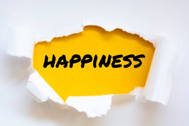 Mutluluk kavramına sahip yırtık kağıt.
