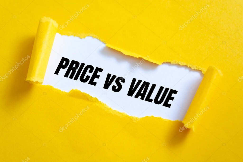 Torn yellow paper revealing the words Price vs Value