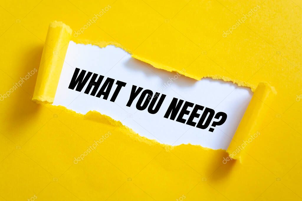 WHAT YOU NEED written under torn paper on the yellow background