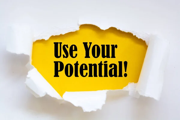 Writing note showing Use Your Potential. Business photo showcasing achieve as much natural ability makes possible Paper clip and torn cardboard on wood classic table backdrop.