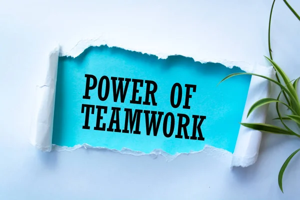 Text sign showing POWER OF TEAMWORK