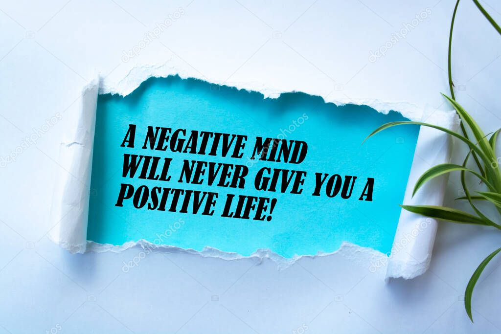 The text A negative mind will never give you a positive life. Motivational quote.