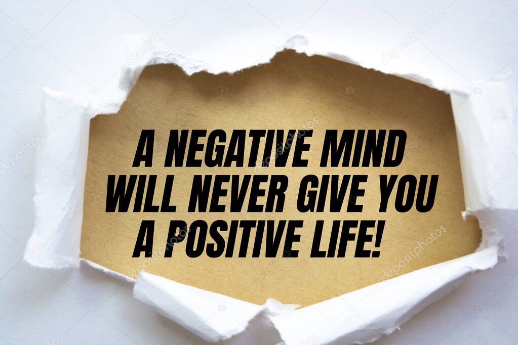 The text A negative mind will never give you a positive life. Motivational quote.