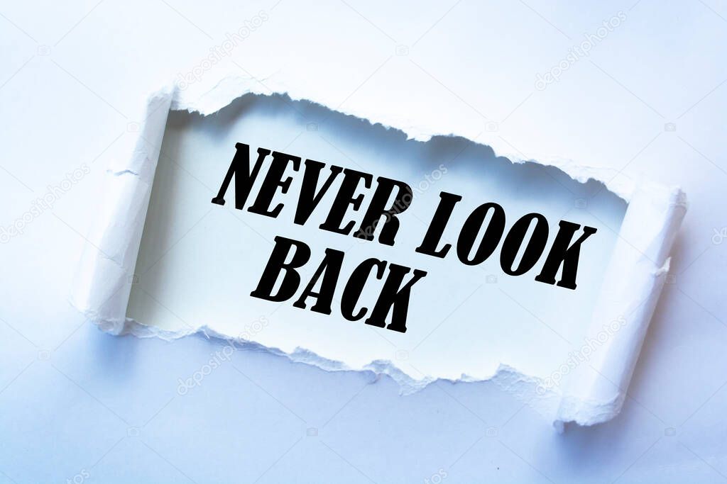 Text sign showing NEVER LOOK BACK