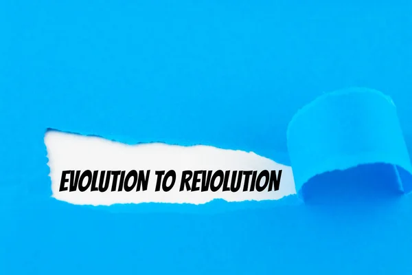Texto Evolución Revolución Que Aparece Detrás Del Papel Azul Rasgado — Foto de Stock
