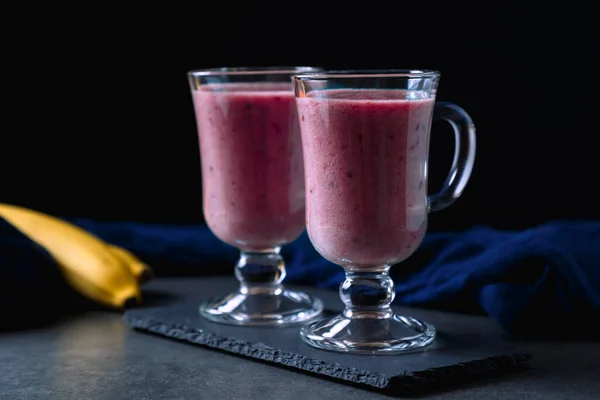Frozen banana and blackberry smoothie. A healthy drink without sugar. Nice cooling on a hot day.
