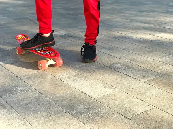 Lviv Ukraine 2021 Fragment Legs Boy Red Sportswear Skateboard City — Stockfoto