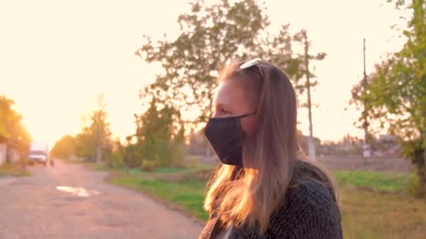 Front View Young Beautiful Girl Medical Black Mask Looks Beautiful — Wideo stockowe