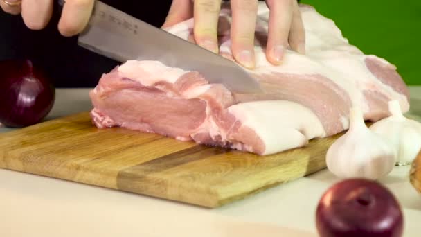 Hands cutting fresh meat — Stock Video