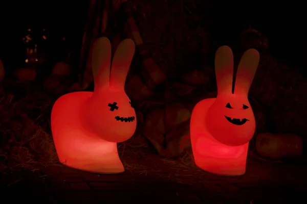 Glowing halloween lights with sinister smiles