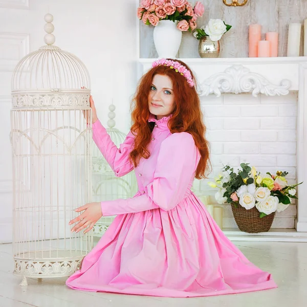 Redhead Pretty Woman Pink Dress Sitting Sunny Spring Day Studio — Stock Photo, Image