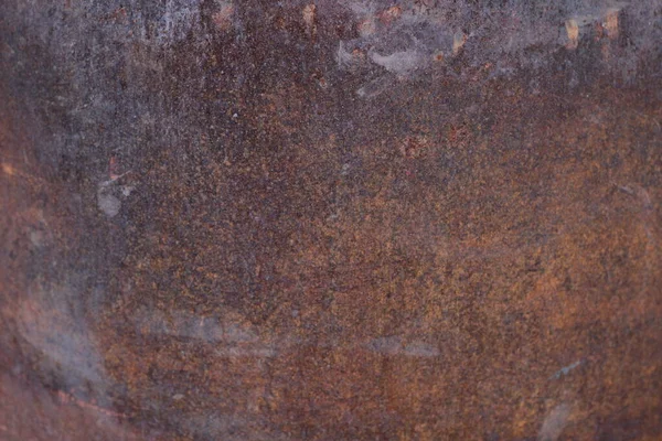 Paslı arka plan, yakın plan paslı kırmızı metal yıpranmış eski yüzey. 