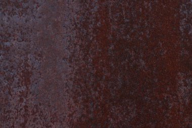 Paslı arka plan, yakın plan paslı kırmızı metal yıpranmış eski yüzey. 