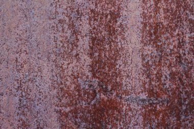 Paslı arka plan, yakın plan paslı kırmızı metal yıpranmış eski yüzey. 