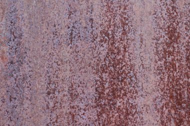 Paslı arka plan, yakın plan paslı kırmızı metal yıpranmış eski yüzey. 