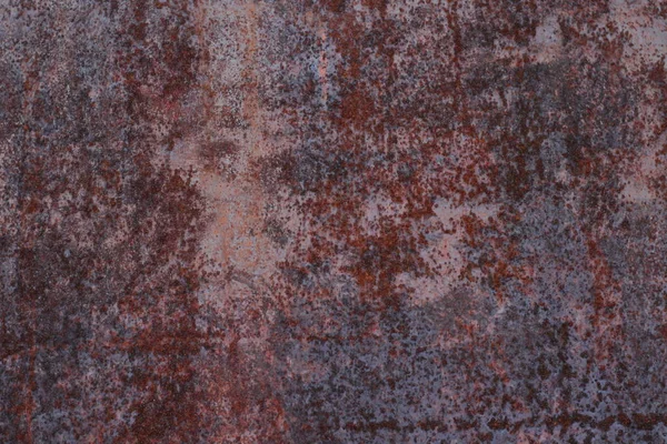 Paslı arka plan, yakın plan paslı kırmızı metal yıpranmış eski yüzey. 