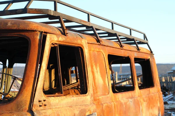 Skeleton of Burnt Car Old Van Rusty Metal