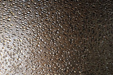 Kırıcı Işıklı Şeffaf Cam Yakın Çekim Yüzey. Olaysız Tümsek Yarı Saydam Doku Arkaplanı