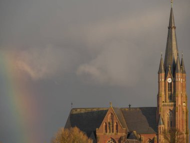 Westphalia 'da gökkuşağı ve kilise