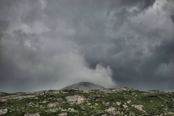 Stormy weather and dramatic cloud scenery over the San Bernardinopass in Switzerland 30.7.2020