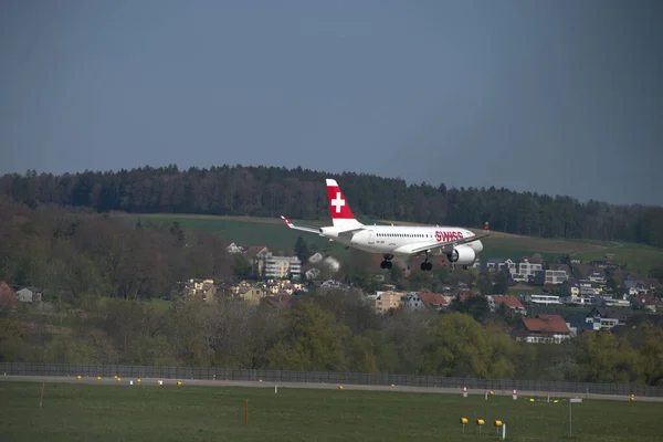 Swiss Bombardier 100 Aircraft Final Approach International Airport Zurich Switzerland — стокове фото