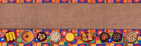 Brazilian june party. Typical foods of the June festival. hominy, boiled corn, corn cake, popcorn, broccoli, paoca, genipapo and peanuts.