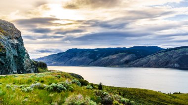Sunset over Kamloops Lake along the Trans Canada Highway in British Columbia clipart