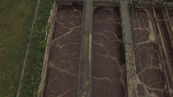 Aerial. Wastewater treatment plant. Flying above cleaning water reservoirs. 4K — Stock Video