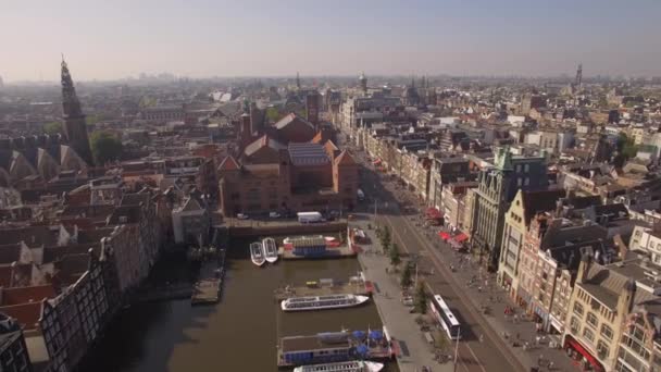 Amsterdam aerial sightseeing. Flying above old centre district. 4K — Stock Video